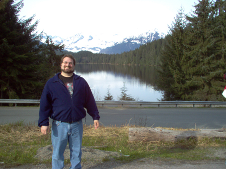 Steve at the Chapel on the Lake posing in front of the Mendenhall Glacier