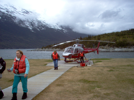 Paula exits the helicopter