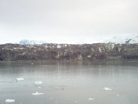 The Grand Pacific Glacier is retreating.  It is covered in rocks and glacier flour making it look dirty