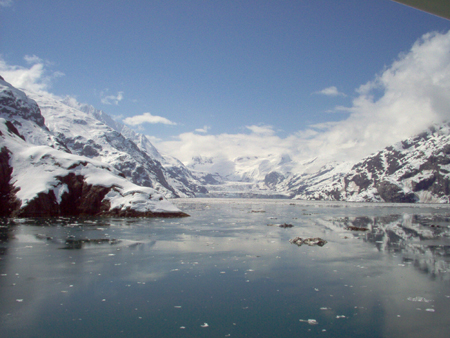 The ship has completed its rotation and is sailing back down the Johns Hopkins Inlet