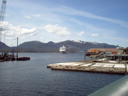 The Norwegian Pearl anchored in the Tongass Narrows.  Ketchikan International Airport is just beyond.