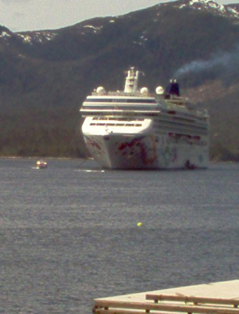 A tender returns after ferrying passengers to the ship